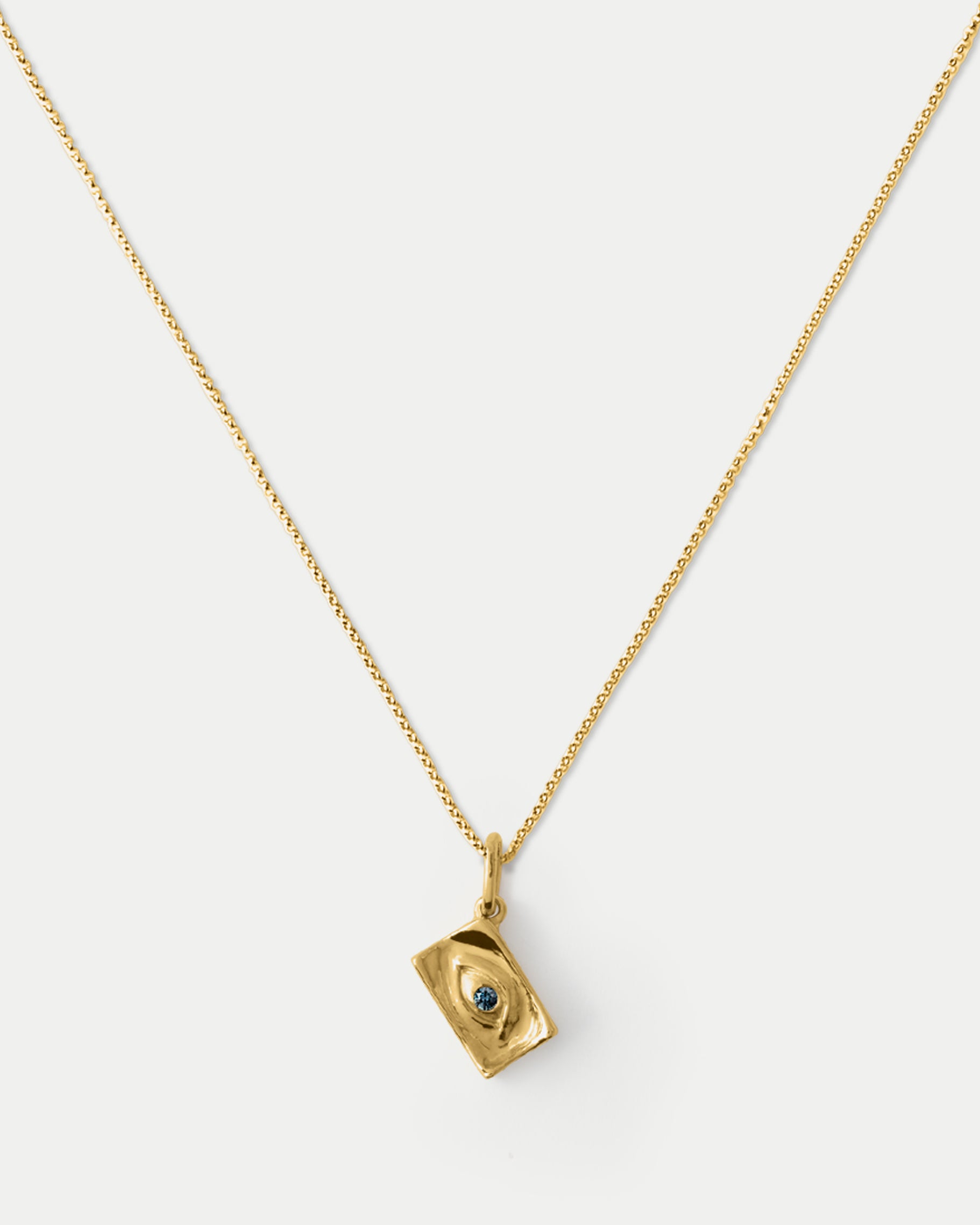 Close view of Classic Amico Pendant ft. Blue Sapphire in 14k yellow gold by Alfonzo