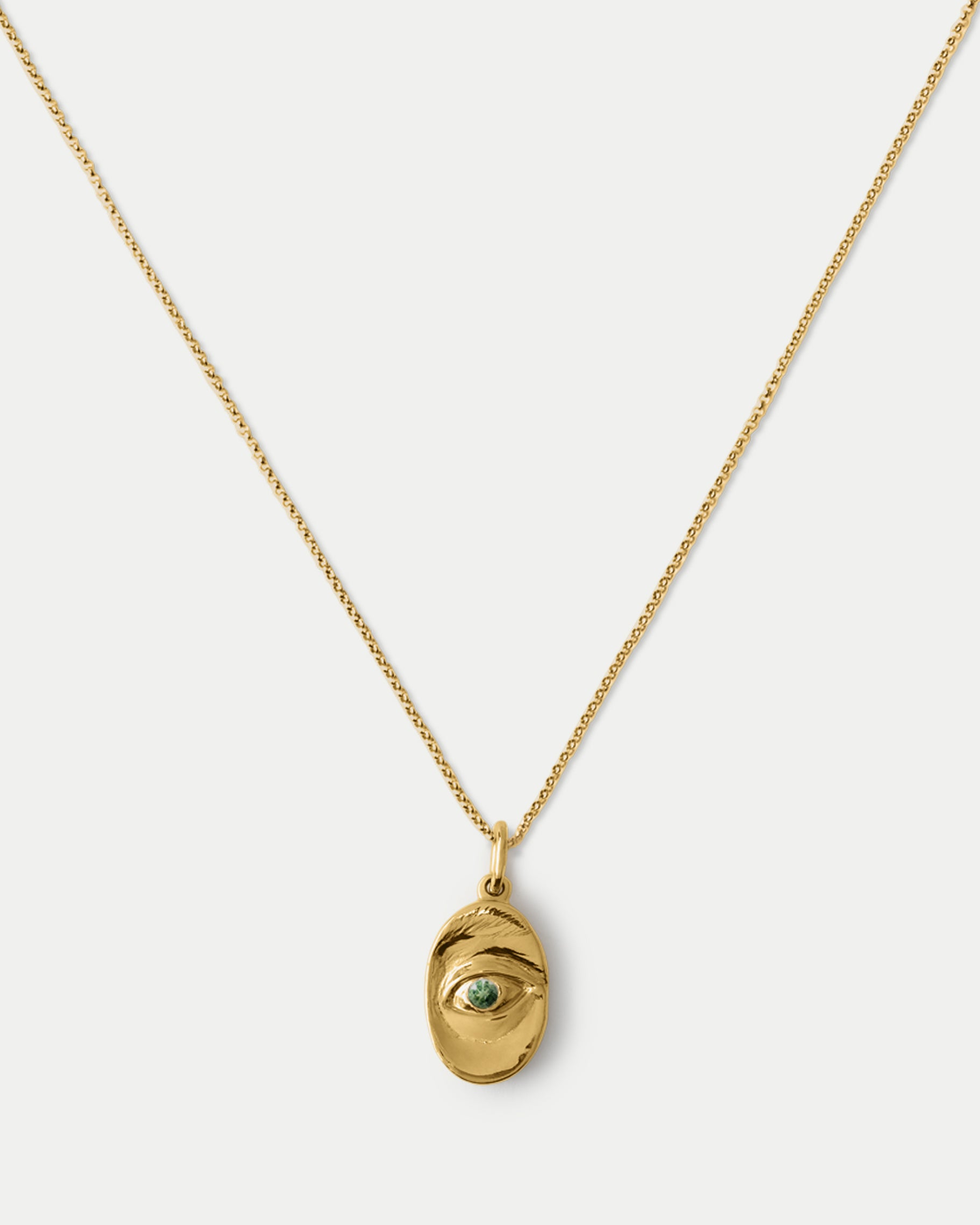 Close view of Classic Oval Pendant ft. Green Sapphire in 14k yellow gold