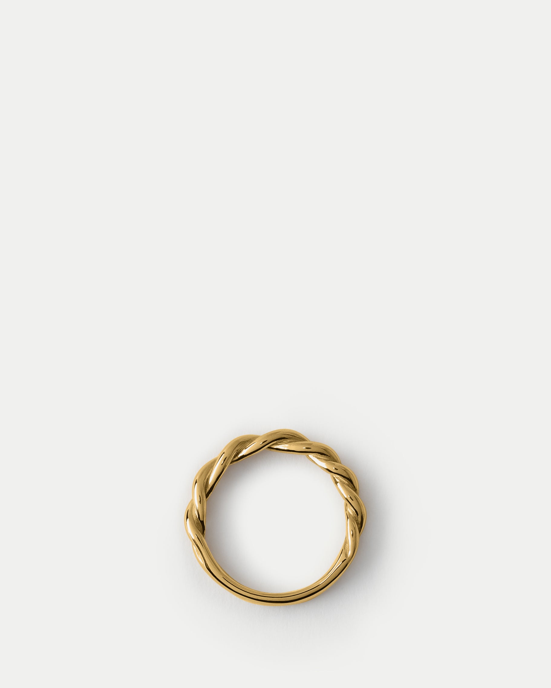 Flat lay view of Enosi Band in 14k yellow gold