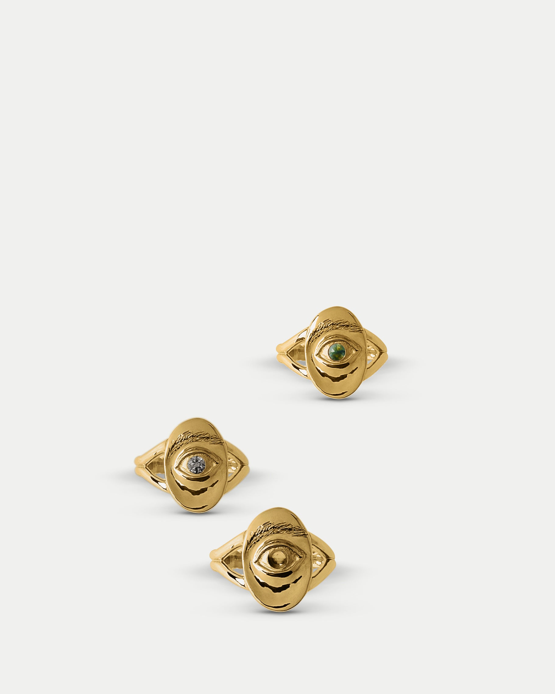 Front view of Oval Amico Ring ft. Green Sapphire, Oval Amico Ring ft. Salt & Pepper Diamond, and Oval Amico Ring ft. Champagne Diamond together