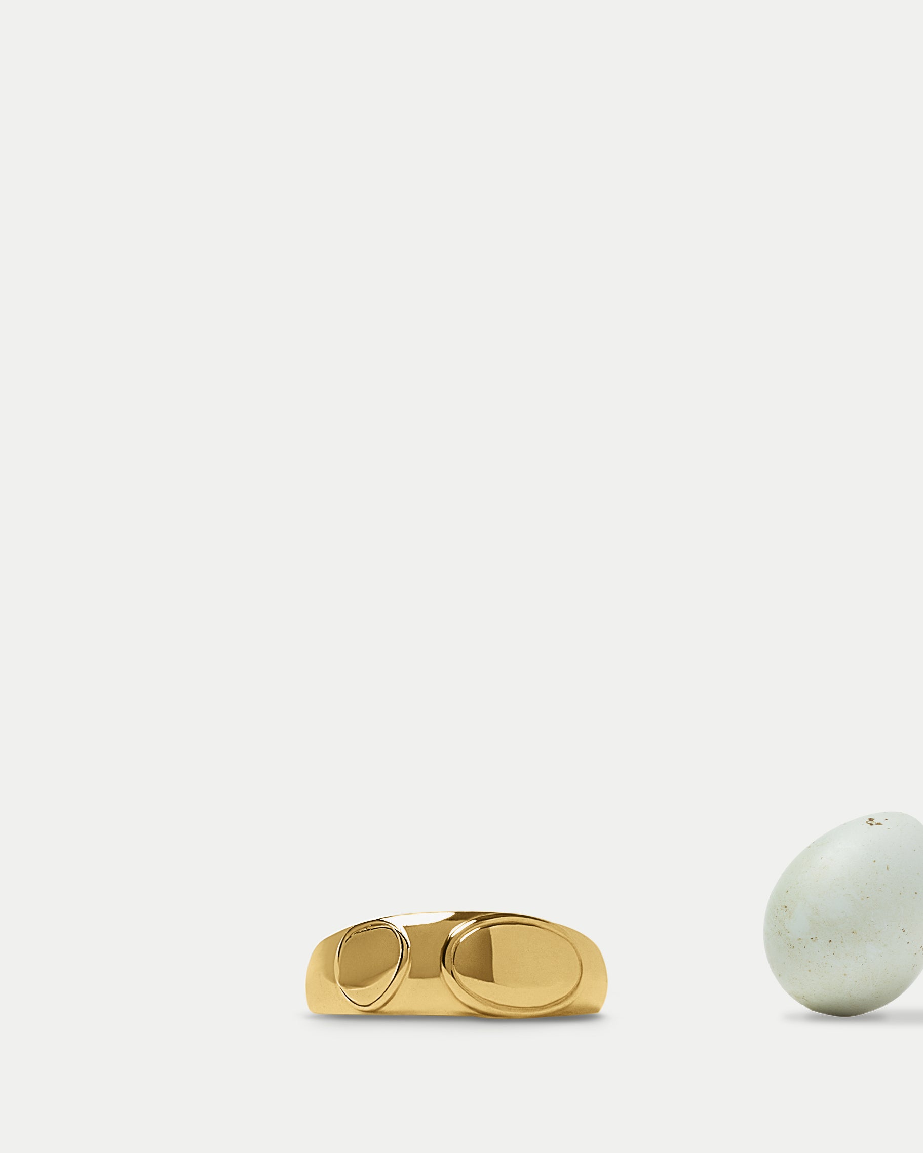 Front view of Janus Oval Signet Ring in 14k yellow gold