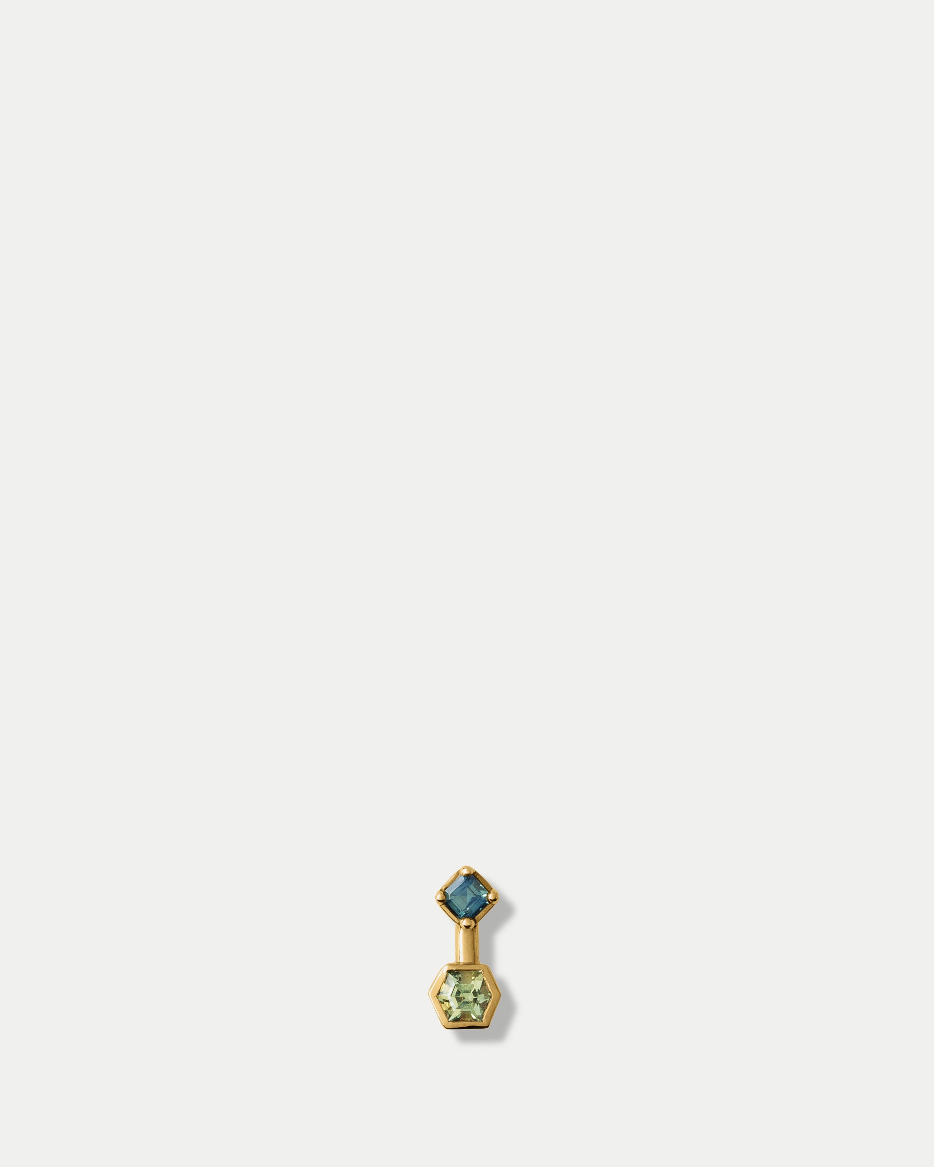 Front view of Canis Minor Stud ft. Green & Teal Sapphire in 14k yellow gold