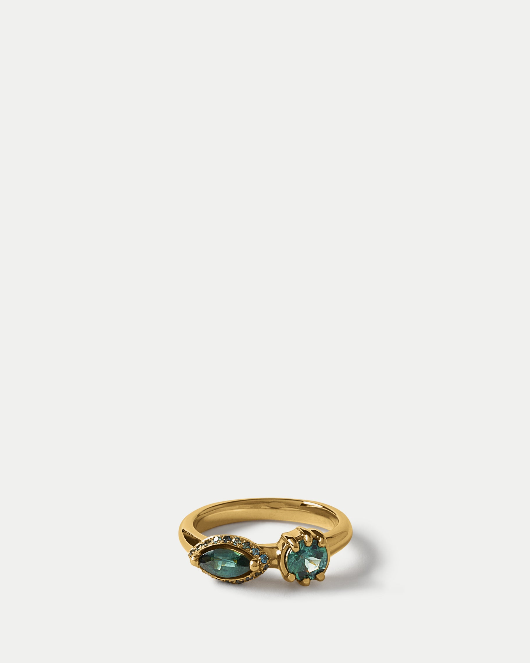 Angled view of Helix Ring ft. Teal Sapphires in 14k yellow gold
