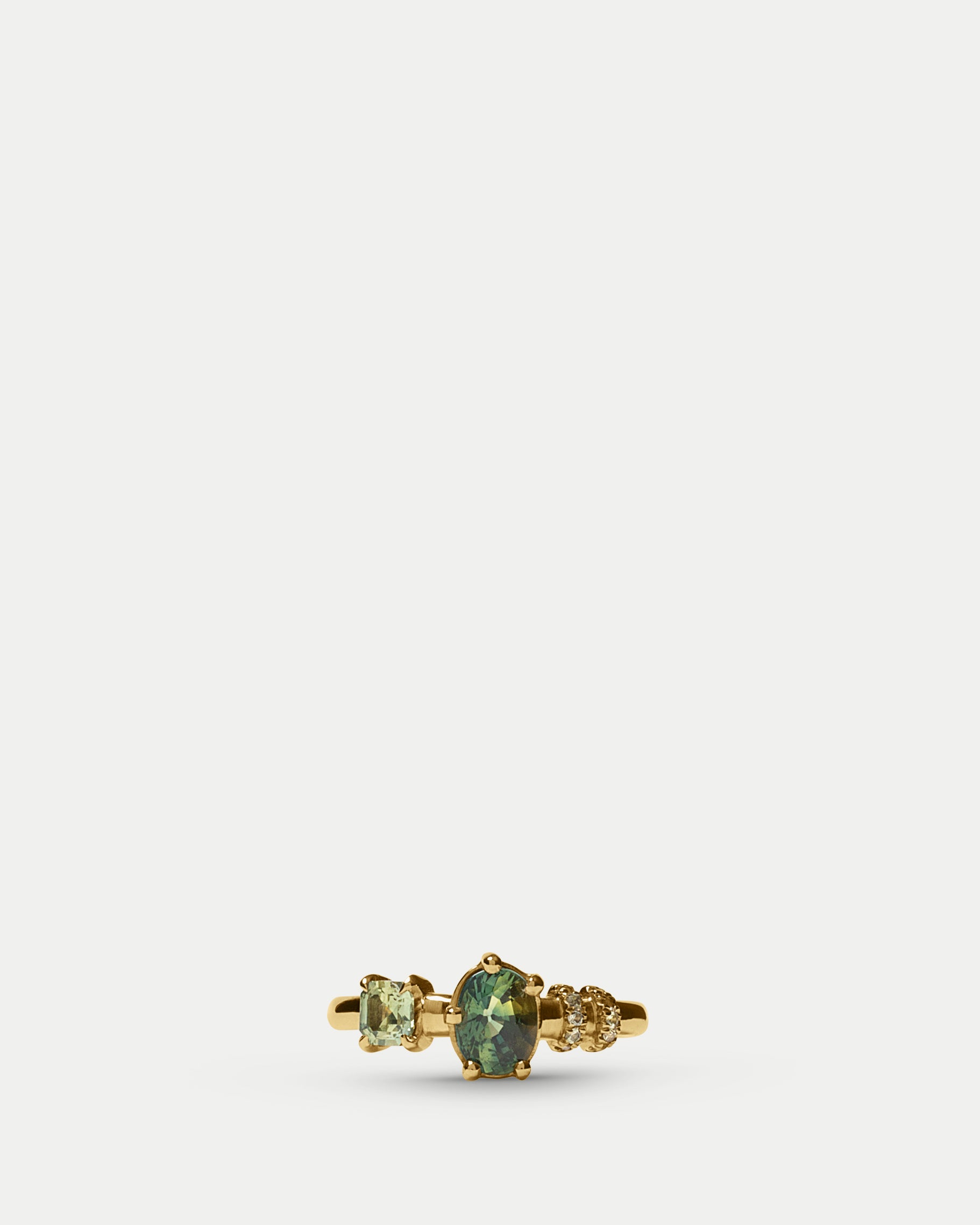 Front view of Monoceros Ring ft. Oval Green Sapphire in 14k yellow gold
