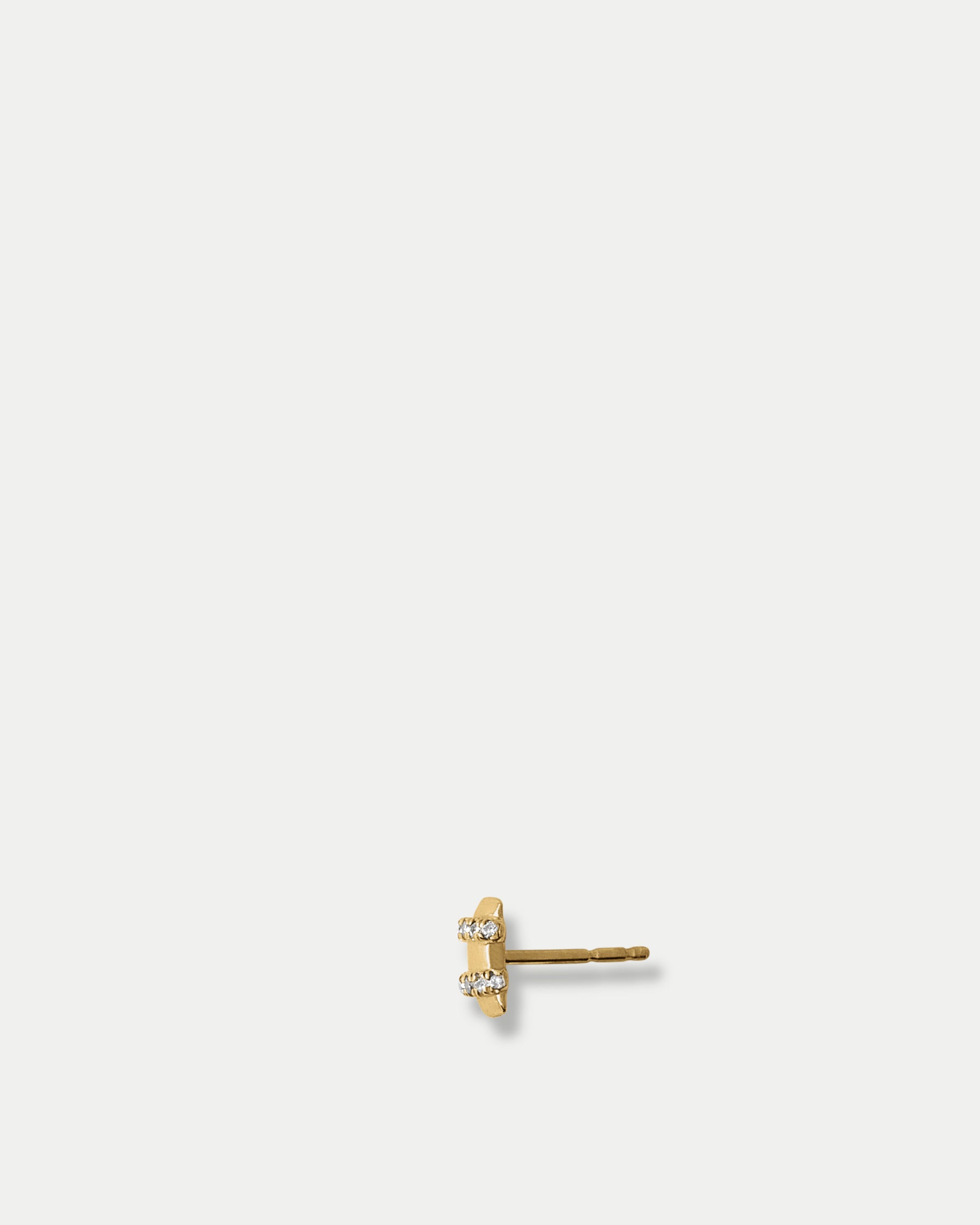 Side view of Orion Duo Stud ft. Salt & Pepper Diamonds in 14k yellow gold