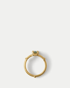 Flat lay view of Orion Solitaire Ring ft. Emerald Green Sapphire in 14k yellow gold