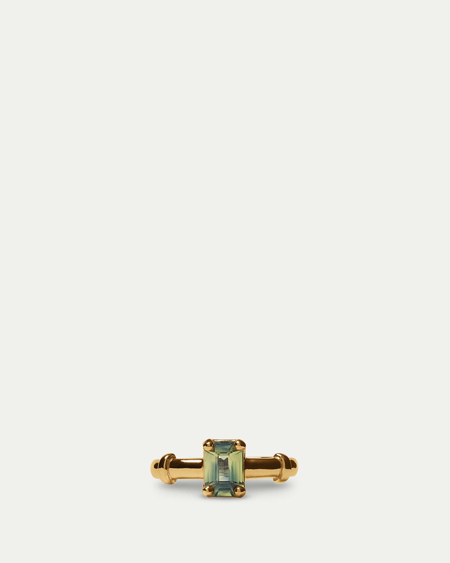 Front view of Orion Solitaire Ring ft. Emerald Green Sapphire in 14k yellow gold