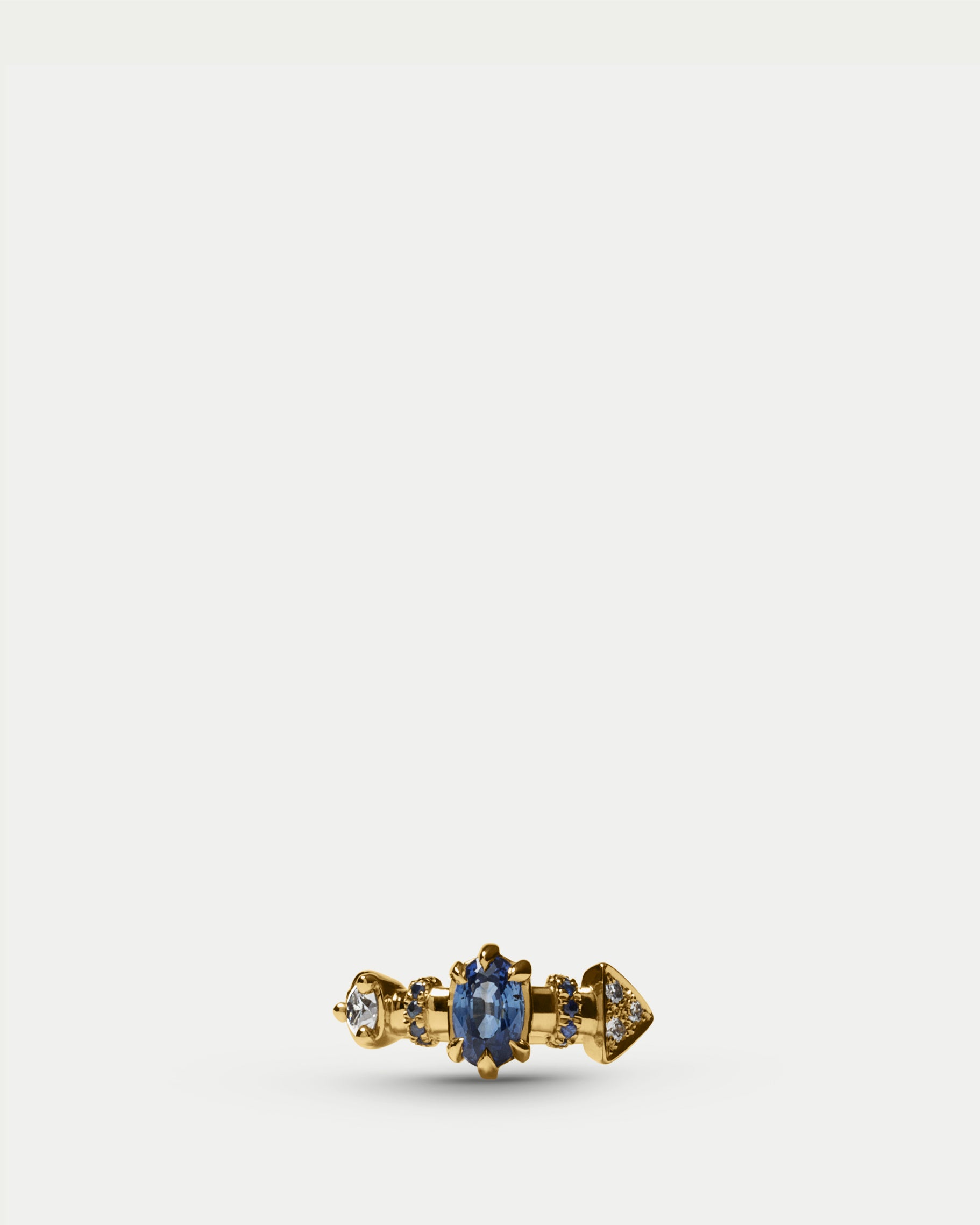 Front view of Supernova Ring ft. Blue Sapphires & White Diamonds in 14k yellow gold